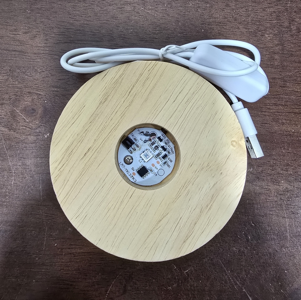 Color-changing LED light base with USB cable